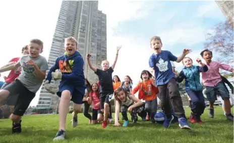  ?? VINCE TALOTTA PHOTOS/TORONTO STAR ?? Some of the 50 or so kids who live at Palace Pier condo community in Toronto who regularly get together to play and hang out.