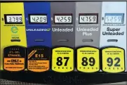  ?? AP PHOTO/NAM Y. HUH ?? Gas prices are seen at a gas station in Riverwoods, Ill., Monday, April 1, 2024. On Wednesday, April 10, 2024, the Labor Department issues its report on inflation at the consumer level in March.