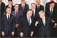  ?? AFP ?? Nato Secretary General Jens Stoltenber­g (left), German Foreign Minister Heiko Maas (second left) and Greece’s Foreign Minister Nikos Kotzias (back centre) look on as Pompeo (front centre) talks with British Foreign Secretary Boris Johnson (front right)...