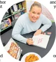  ?? Photo / Supplied ?? Vanya Insull signs her new cookbook, “Everyday Favourites”, at a launch at Paper Plus Taupō .