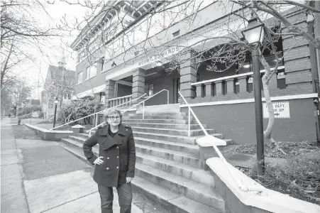  ?? DARREN STONE, TIMES COLONIST ?? Gillian Ley in front of Mount Edwards Court, which provides transition­al housing and support services for 38 people, most of whom had been homeless and living at the nearby tent city at Quadra Street and Burdett Avenue. Ley, who lives about a block...