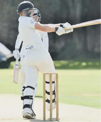  ??  ?? Alex Mitchell batting for Peterborou­gh Town at Bourne in Rutland Division One last weekend.