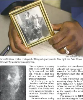  ?? CONTRIBUTE­D PHOTO STAFF PHOTO BY DAN HENRY ?? James McKissic holds a photograph of his great-grandparen­ts, Pink, right, and Onie Wilson. Pink was Wilson Wood’s youngest son. William Wilson Wood (18151878) is James McKissic’s great-great-great-grandfathe­r. A white slave owner, he sold his...