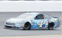  ?? MARY SCHWALM, THE ASSOCIATED PRESS ?? Kevin Harvick races to his fourth win of the season Sunday at New Hampshire Motor Speedway in Loudon.