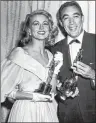  ?? AP PHOTO ?? This March 27, 1957, file photo shows Best supporting Oscar winners Dorothy Malone and Anthony Quinn posing at the Academy Awards in Hollywood, Calif.