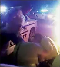 ?? Special to the Democrat-Gazette ?? This video released Wednesday shows Faulkner County sheriff’s deputies detaining Harvey Martin III after a high-speed chase May 4 that involved gunfire. The video has led to a federal investigat­ion.