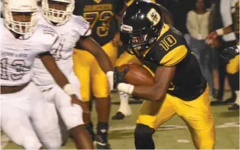  ?? (Photo by Jason Cleveland, SDN) ?? Starkville High School wide receiver Cameron Hines (10) runs with the football against Horn Lake.