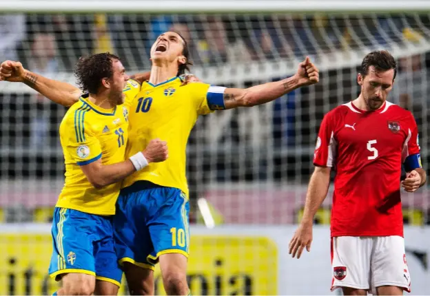  ??  ?? Above: In this shot of a Sweden vs Austria internatio­nal you don’t need to know the end score to tell what’s happening. The dejection of the player in red and the powerful celebratio­n of Zlatan Ibrahimovi­ć says it all. It’s storytelli­ng.