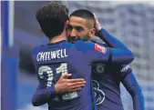  ?? AFP ?? Chelsea substitute Hakim Ziyech celebrates scoring their second goal with Ben Chilwell, who provided the assist