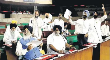  ?? KESHAV SINGH /HT ?? ■ SADBJP legislator­s protesting during the budget speech at the Punjab Vidhan Sabha in Chandigarh on Thursday.
