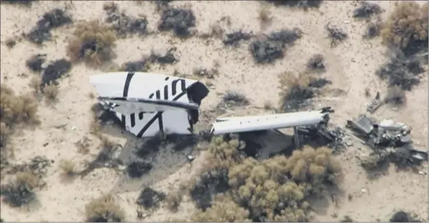  ??  ?? Wreckage of the craft lies strewn across the barren Mojave landscape. Sir Richard Branson was on his way to the crash site last night