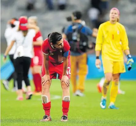  ?? PEDRO VILELA/GETTY IMAGES ?? Canadian captain Christine Sinclair looks down the field after her team lost its semifinal match against Germany in Belo Horizonte, Brazil, on Tuesday. Canada lost 2-0 and will play Brazil in the bronze medal match on Friday in Sao Paulo.
