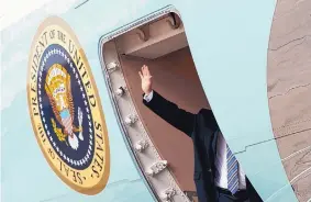  ?? CAROLYN KASTER/ASSOCIATED PRESS ?? President Donald Trump waves as he boards Air Force One at Andrews Air Force Base in Maryland Friday en route to Palm Beach Airport in Florida.