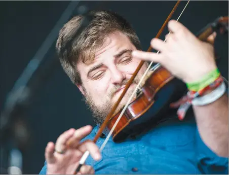  ?? (NWA Democrat-Gazette File Photo/Charlie Kaijo) ?? Michael Schembre, fiddle player and husband to Opal Agafia, will perform with her band as well as present his hip-hop fiddle show during Ozark Mountain Soul at The Farm in Eureka Springs. The music and art festival will be April 4-8.