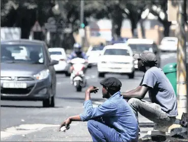  ?? PHOTO: HENK KRUGER ?? Labourers wait on a pavement for short-term work opportunit­ies. South Africa’s Statistici­an-General Dr Pali Lehohla lamented the collapse of a critical meeting in Dakar, where the continent was to find solutions to sustainabl­e job creation.