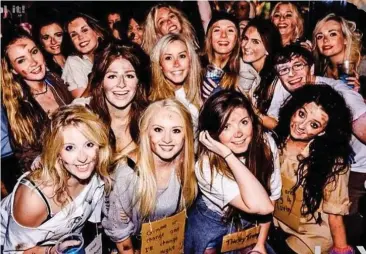  ??  ?? Tramps night out: Students dressed up in ragged clothes and dirtied up their faces