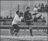  ?? MEGAN WIDICK Special to the Valley Press ?? BALL CONTROL Knight’s Kenny Oropeza, right, kicks the ball against Palmdale’s Joaquin Alvarado, left, during Friday’s Golden League game.