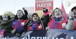  ?? — AP ?? ANKARA: Thousands of members of Turkey’s main opposition Republican People’s Party march to the parliament in Ankara yesterday. Following a public outcry, Turkey’s government has withdrawn a proposal that critics said would have allowed men accused of...