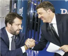  ?? Ansa ?? Qua la mano Il leghista Matteo Salvini e Matteo Renzi (Iv)