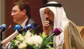  ?? REUTERS PIC ?? Saudi Arabian Energy Minister Khalid Al-Falih (right) and his Russian counterpar­t Alexander Novak at a meeting in St Petersburg yesterday.