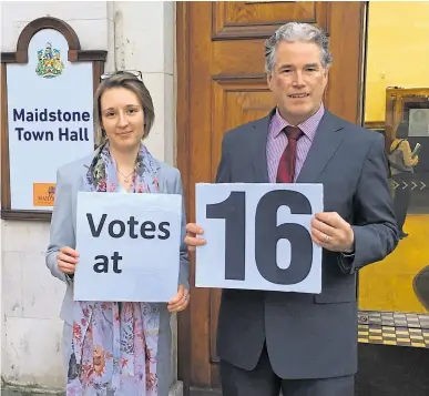  ??  ?? Councillor­s Georgia Harvey and Brian Clark outside Town Hall on Wednesday