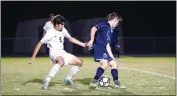  ?? PHOTO BY DARNELL MARBURY ?? La Plata’s Robbie Delozier tries to get around Huntingtow­n’s Nick Krisko in Tuesday night’s 1-0 win in a SMAC nondivisio­n boys soccer contest.