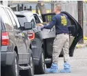  ?? AMY NEWMAN/NORTH JERSEY MEDIA GROUP ?? FBI agents conduct a search of the home of Sayfullo Saipov, the suspect in the New York City terror attack, on Tuesday in Lower Manhattan.