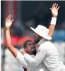  ?? AP ?? Ishant celebrates with Rahul (right) the dismissal of Mahmudulla­h. —