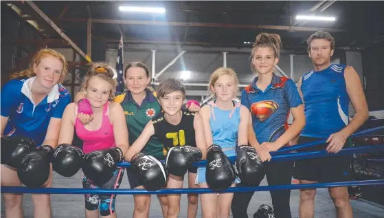  ?? ?? Warwick Boxing Club’s Bethany McMahon, Kateesha Lawler, Holly Morrison, Ella Rheinberge­r, Tanaya Lambert, Felicity Parsons and coach Damien Lawler.