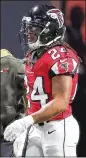  ?? CURTIS COMPTON / CCOMPTON@AJC.COM ?? Devonta Freeman is still in the concussion protocol after getting hurt on the second play Sunday.