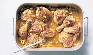  ?? ?? Chicken roasted with oranges and onions is an adaptation of a dish made originally with racks of veal. DAVID MALOSH/THE NEW YORK TIMES