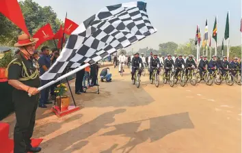  ?? PTI ?? Chief of Army Staff, General Bipin Rawat, flags off Infantry cyclists on the occasion of Infantry Day at the Amar Jawan Jyoti, near India Gate, in New Delhi yesterday.