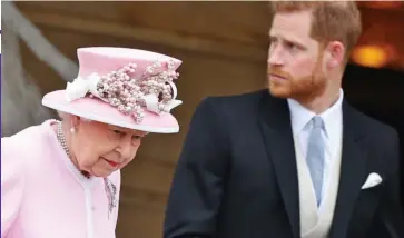  ?? ?? The generation game: Prince Harry with the Queen at Buckingham Palace in 2019