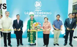  ??  ?? Cabanatuan City Mayor Julius Cesar Vergara (second from left), and Vice Mayor Jolly Garcia (second from right) were guests of honor during the recent opening of SM City Cabanatuan. They are joined by Felicidad T. Sy, SM Prime Holdings, Inc. President...