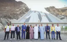  ?? ?? ■ Saeed Al Tayer and other officials during the launch of the constructi­on work for the Hatta Sustainabl­e Waterfalls project.