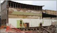  ?? Doug Walker /
Rome News-tribune ?? The Southeast Gas Appliances building, 310 Broad St., will get new footings, a rebuilt wall and a roof after demolition of the adjacent three buildings.