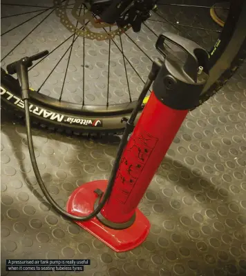  ??  ?? A pressurise­d air tank pump is really useful when it comes to seating tubeless tyres