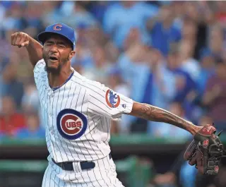  ?? JERRY LAI, USA TODAY SPORTS ?? Chicago relief pitcher Carl Edwards Jr. celebrates after ending the eighth inning of a 2-1 Cubs victory against Washington on Monday.