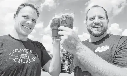  ?? Stephen M. Dowell / Orlando Sentinel ?? Jared Witt, left, and Aaron Schmalzle plan to open a brew pub in Orlando in coalition with their Lutheran faith.