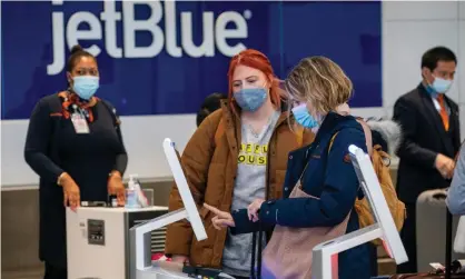  ?? ?? JetBlue says its cancellati­ons will continue until 13 January. Photograph: Shawn Thew/EPA