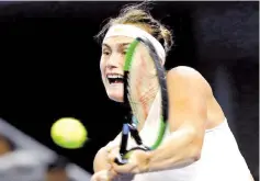  ?? Photo — Reuters ?? Aryna Sabalenka of Belarus in action against Qiang Wang of China during the China Open Women's Singles quarterfin­als at National Tennis Center, Beijing, October 5, 2018.
