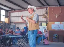  ?? EDDIE MOORE/JOURNAL ?? Randy Davis, who along with other family members is co-owner and operator of the CS Ranch near Cimarron, talks about their hunting and outfitting company with teenagers taking a weeklong ranch management course put on by NMSU.