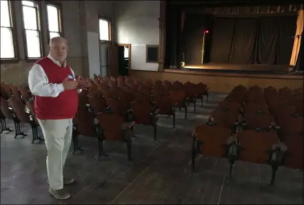  ?? RICHARD PAYERCHIN — THE MORNING JOURNAL FILE ?? Harbourtow­n Fine Arts Center President Jim Chapple speaks while on the stage in the opera house of an 1883Town Hall building in 2020 in Vermilion. Harbourtow­n Fine Arts Center and the Cleveland Ballet have announced a plan for the Cleveland-based dance troupe to have a summer residency at the center in August and September.