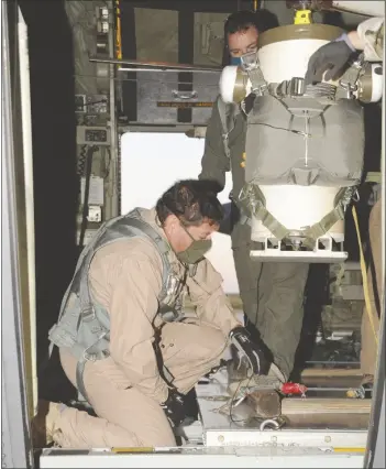  ??  ?? Now long-fielded, the T-11 parachute is still returning to YPG for further refinement­s and improvemen­ts. In addition to testing a new pack tray, testers are currently testing improvemen­ts to the T-11’s reserve parachute. (Photo by Mark Schauer)