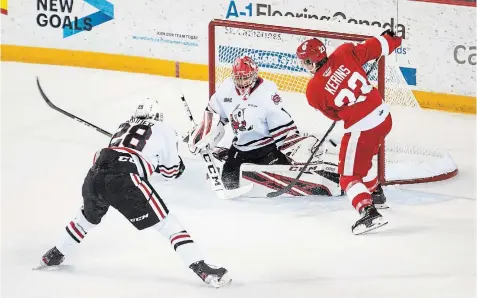  ?? JULIE JOCSAK TORSTAR FILE PHOTO ?? Netminder Tucker Tynan defends the Niagara goal against Sault Ste. Marie’s Rory Kerins in December 2019. Tynan, while still eligible to return to Niagara, signed an amateur tryout deal with the AHL’S Iowa Wild.