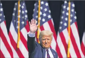  ?? JOHN MINCHILLO — THE ASSOCIATED PRESS ?? President Donald Trump waves to the audience Thursday after speaking at a campaign rally at Mariotti Building Products in Old Forge, Lackawanna County.