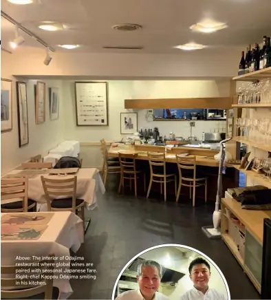  ?? ?? Above: The interior of Odajima restaurant where global wines are paired with seasonal Japanese fare. Right: chef Kappou Odajima smiling in his kitchen.