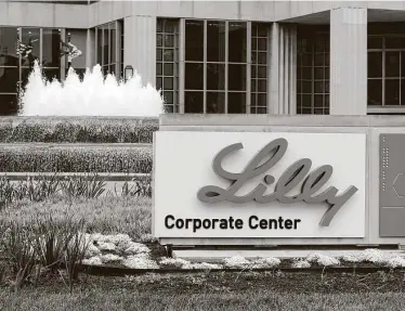  ?? Darron Cummings / Associated Press ?? While the COVID-19 medication made by Eli Lilly is welcome news to many in Texas’ health care community, its supplies are so limited that some hospitals are weighing how to ethically prioritize eligible patients.