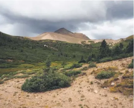  ??  ?? The Rio Grande Pyramid on the Continenta­l Divide as seen from the Rincon La Vaca Trail after leaving Weminuche Pass.
Dean Krakel, Special to The Denver Post