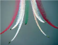  ?? AFP ?? An aerobatic team performs during celebratio­ns to mark the country’s Independen­ce Day in Islamabad. —